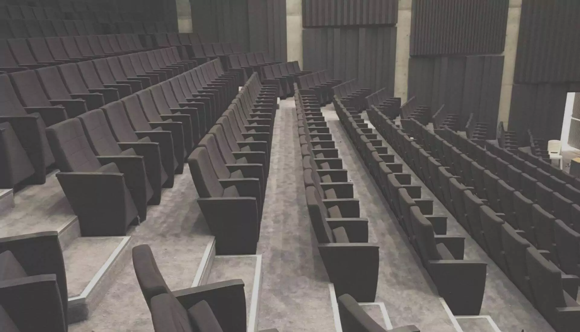 Stylish and comfortable auditorium seating Image